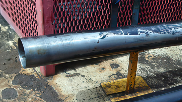 Damaged tubular section recovered during an E-line workover offshore East Timor, following milling and fishing operations to clear debris and restore 100MMscfd gas production