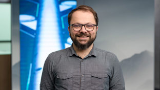 Fabio Rosas Gutterres, Technical Manager – Well Completion Operation, standing in front of a modern Welltec background display.